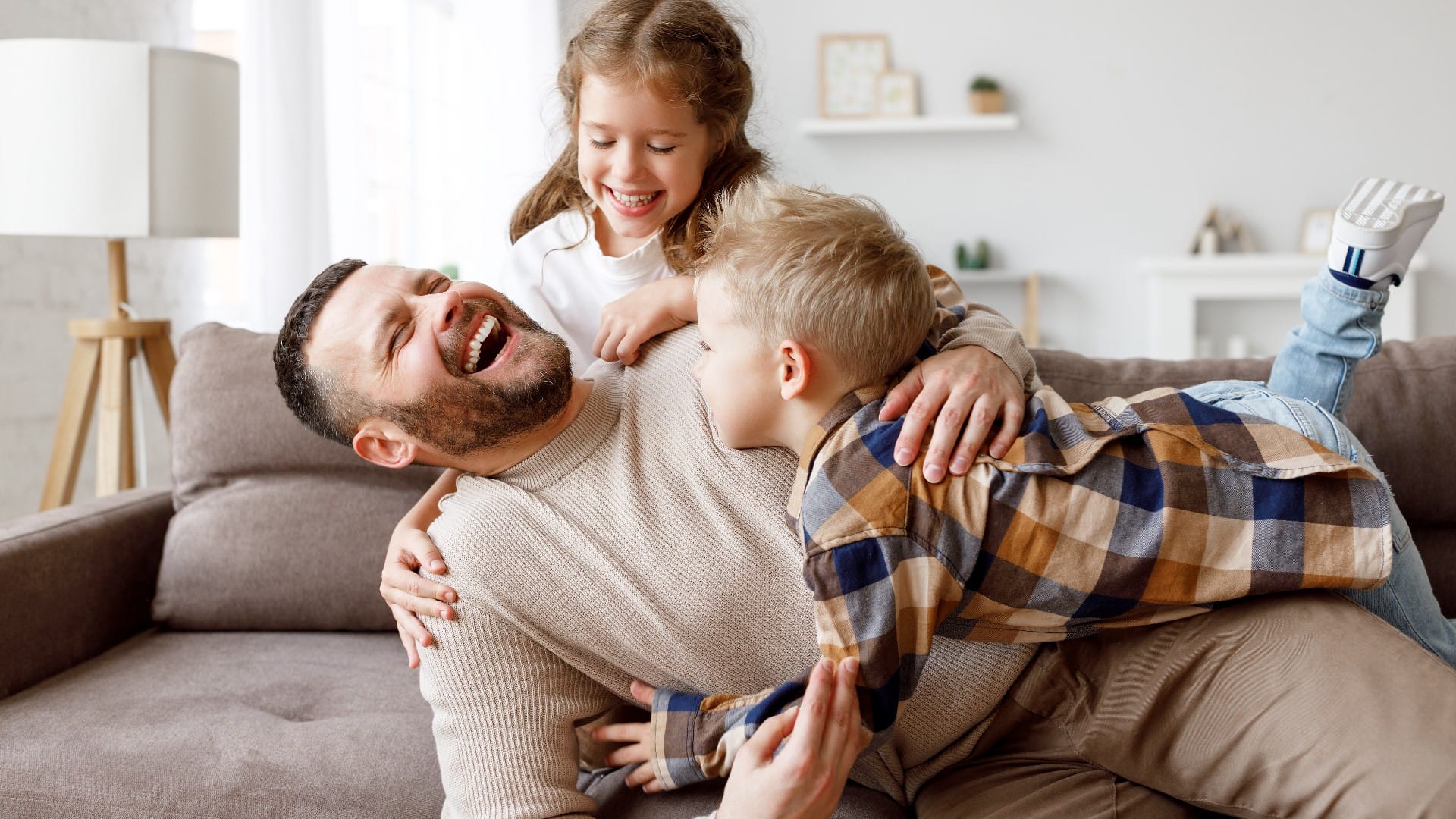 dad playing with his kids